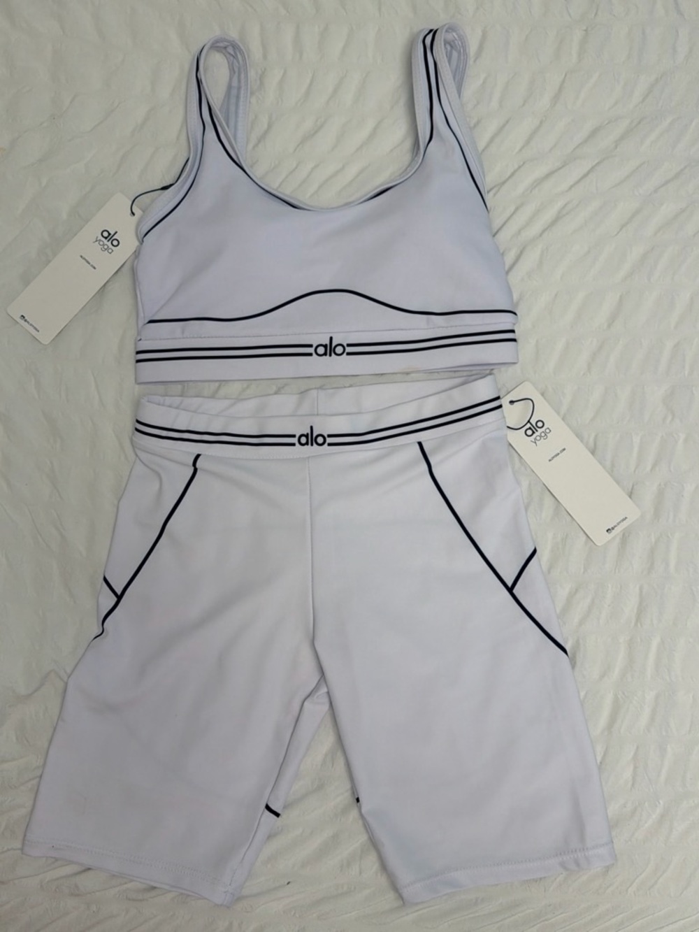 ALO Yoga White Sports Bra and Bike Shorts with Black Trim
